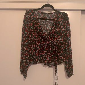 Faux wrap peplum top